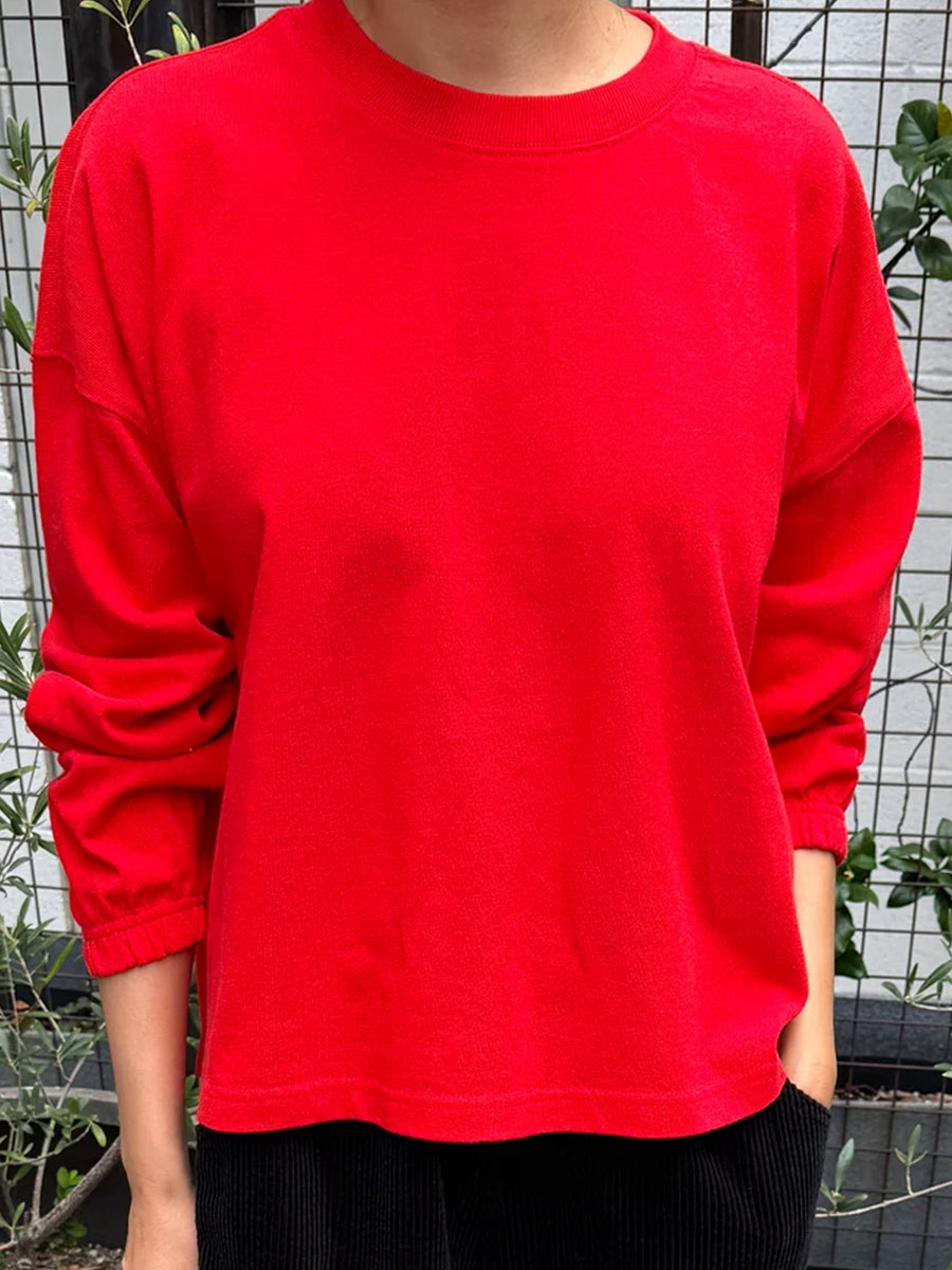 Front view of the Le Bon Shoppe Naturelle Tee in Tomato, showing the relaxed fit and elasticated cuffs | Twentyseven Toronto
