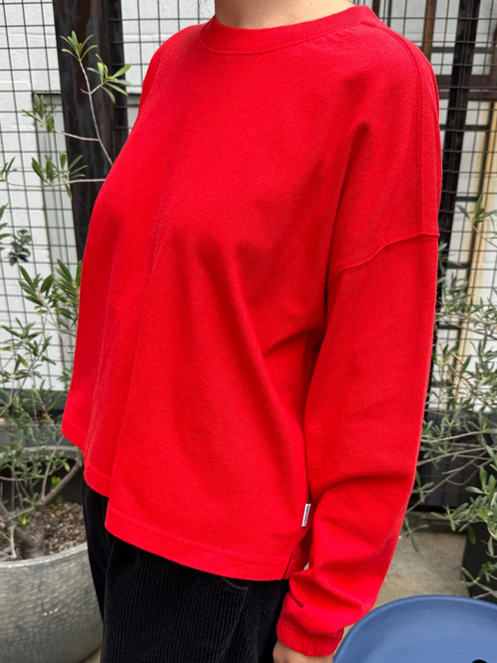 Model wearing the Le Bon Shoppe Naturelle Tee in Tomato with black pants | Twentyseven Toronto