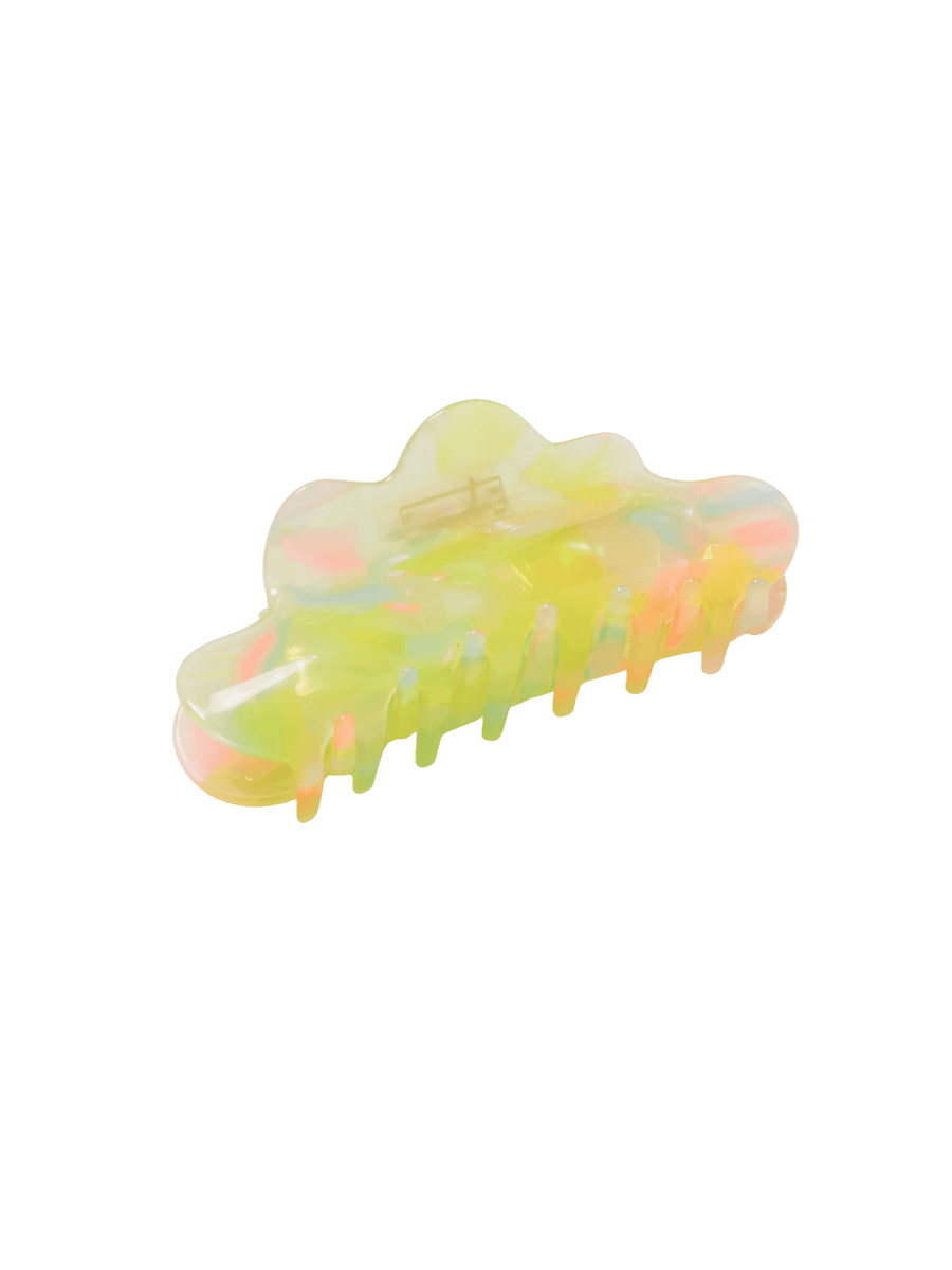 The wavy, translucent CHUNKS Nimbus Claw Clip in Sherbet Jelly is displayed at an angle to showcase its yellow, pink, and green marbled design | Twentyseven Toronto