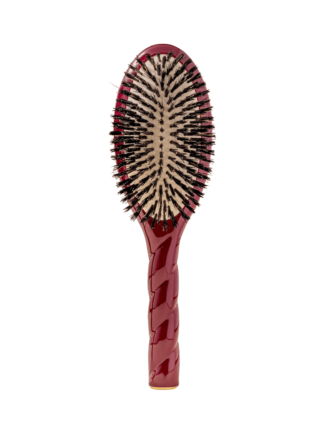 Front view of La Bonne Brosse N.01 The Shine & Care Hairbrush The Universal Brush in Cherry Red featuring a twisted ergonomic handle and natural boar bristles | Twentyseven Toronto