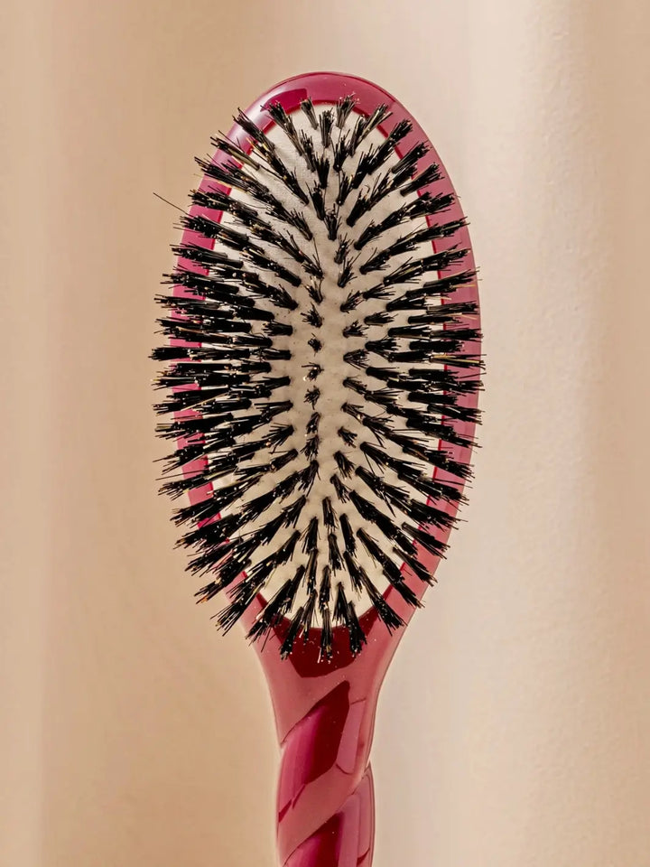 Front shot of the oval head and high-quality tufts of La Bonne Brosse N.01 The Shine & Care Hairbrush The Universal Brush in Cherry Red | Twentyseven Toronto