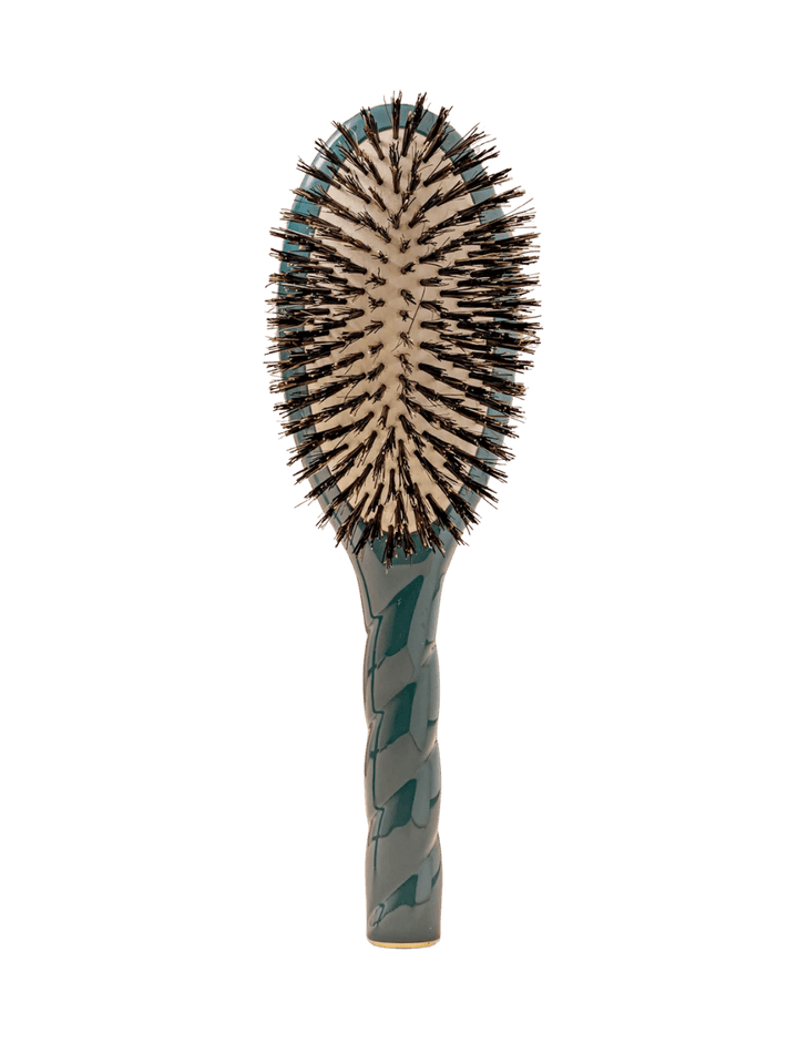 Front view of La Bonne Brosse N.01 The Shine & Care Hairbrush The Universal Brush in Ink Blue featuring a twisted ergonomic handle and natural boar bristles | Twentyseven Toronto