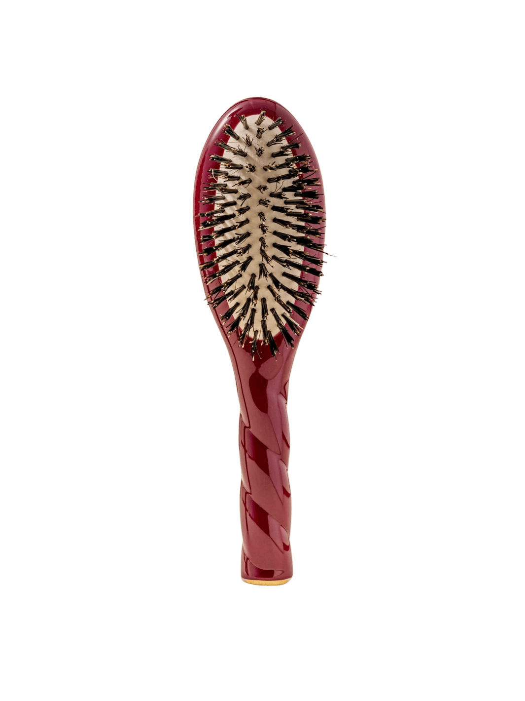 Front view of La Bonne Brosse N.01 Small The Shine & Care Hairbrush The Universal Brush in Cherry Red featuring a twisted ergonomic handle and natural boar bristles | Twentyseven Toronto