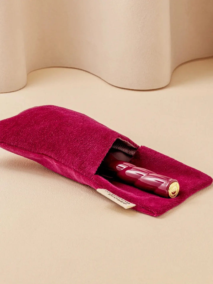 La Bonne Brosse N.01 Small The Shine & Care Hairbrush The Universal Brush in Cherry Red is partially tucked into a luxurious matching red velvet travel pouch | Twentyseven Toronto