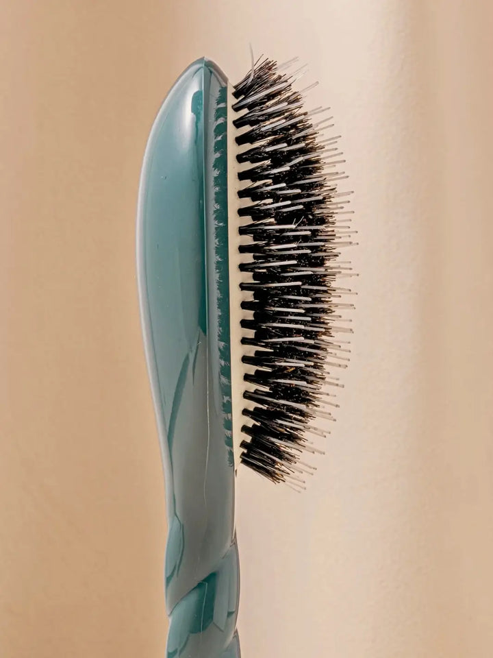 Close-up side profile shot highlights the tiered bristle design of La Bonne Brosse N.02 Large The Essential Detangling & Conditioning Brush in Ink Blue | Twentyseven Toronto