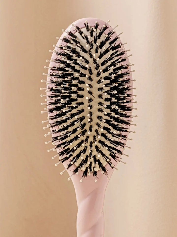 Close up front shot of La Bonne Brosse N.03 Large The Essential Softness & Sensitive Scalp Brush in Lilac Pink | Twentyseven Toronto