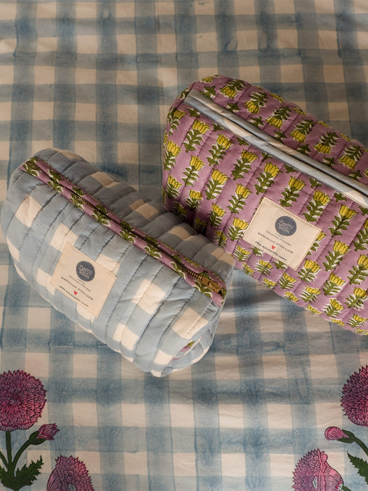 Doing Goods Nova Make-up Bag Medium | Twentyseven Toronto | Reversible blue and multi-colour makeup pouch