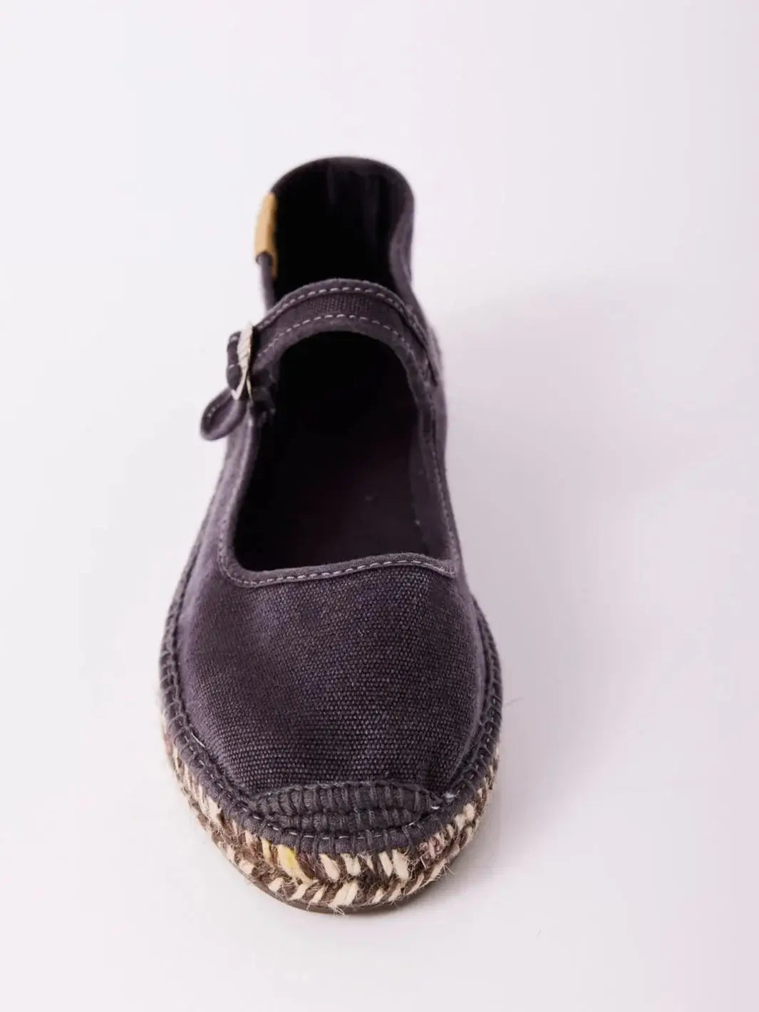 A straight-on front angle showcases the rounded toe box and textured jute bumper of the Free People Oasis Mary Jane Espadrilles - Washed Black | Twentyseven Toronto