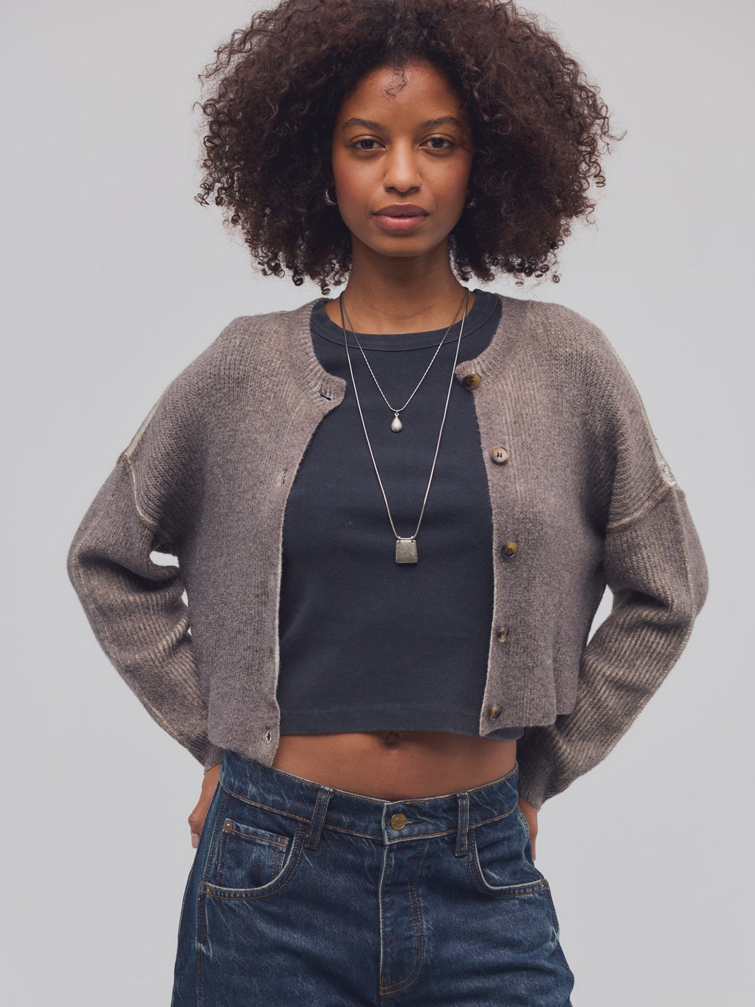 Close-up of the Free People Ottilie Cardi in Espresso layered over a dark top, showing the soft knit texture and button details | Twentyseven Toronto