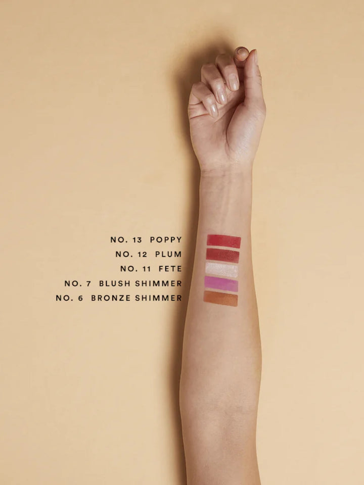 Olio E Osso balm swatches on an arm with medium complexion | Twentyseven Toronto