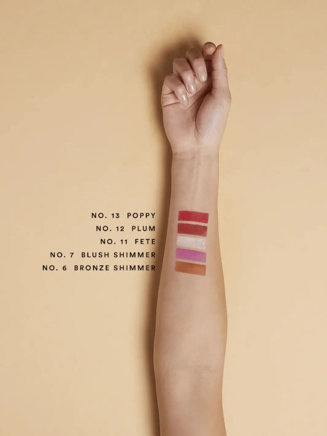 Olio E Osso balm swatches on an arm with medium complexion | Twentyseven Toronto