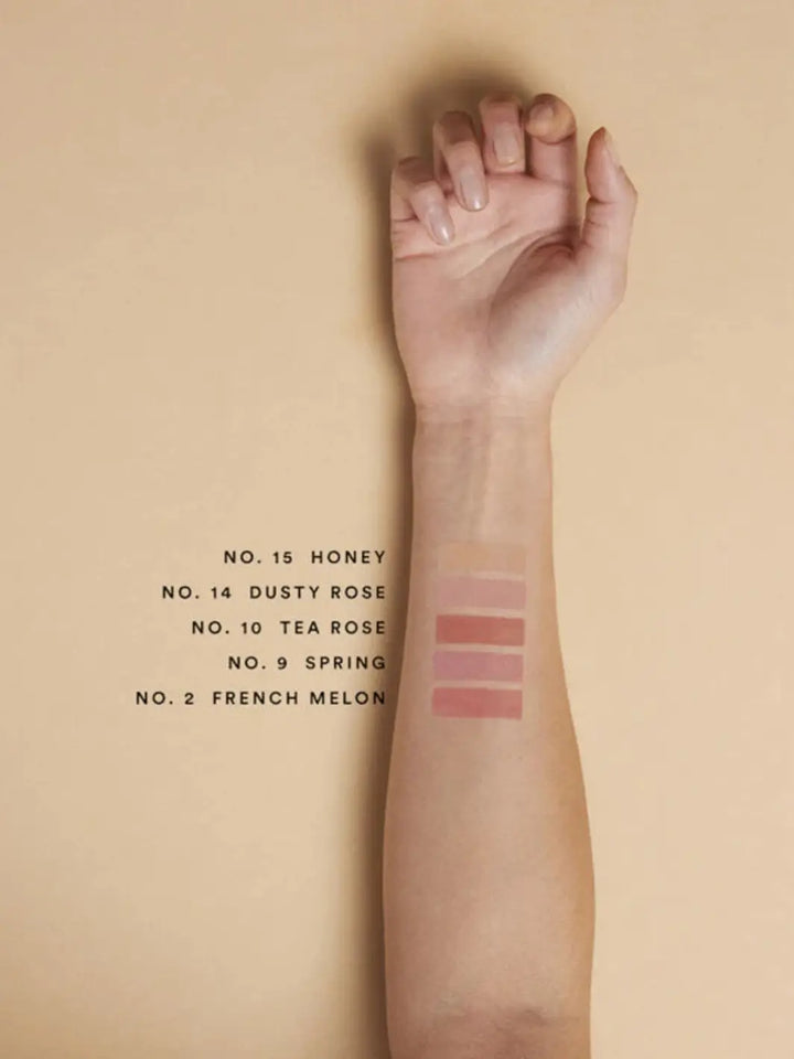 Olio E Osso balm swatches on an arm with medium complexion | Twentyseven Toronto