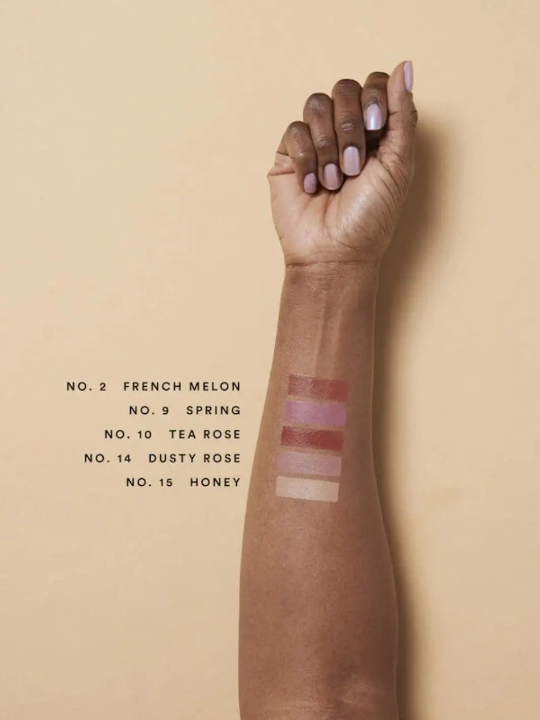Olio E Osso balm swatches on an arm with darker complexion | Twentyseven Toronto
