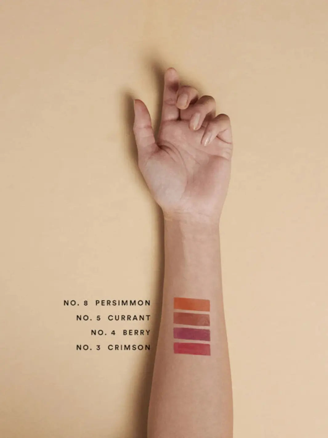 Olio E Osso balm swatches on an arm with medium complexion | Twentyseven Toronto