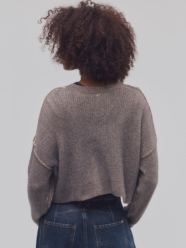 Back view of the Free People Ottilie Cardi in Espresso, showing its relaxed cropped silhouette and ribbed knit detailing | Twentyseven Toronto