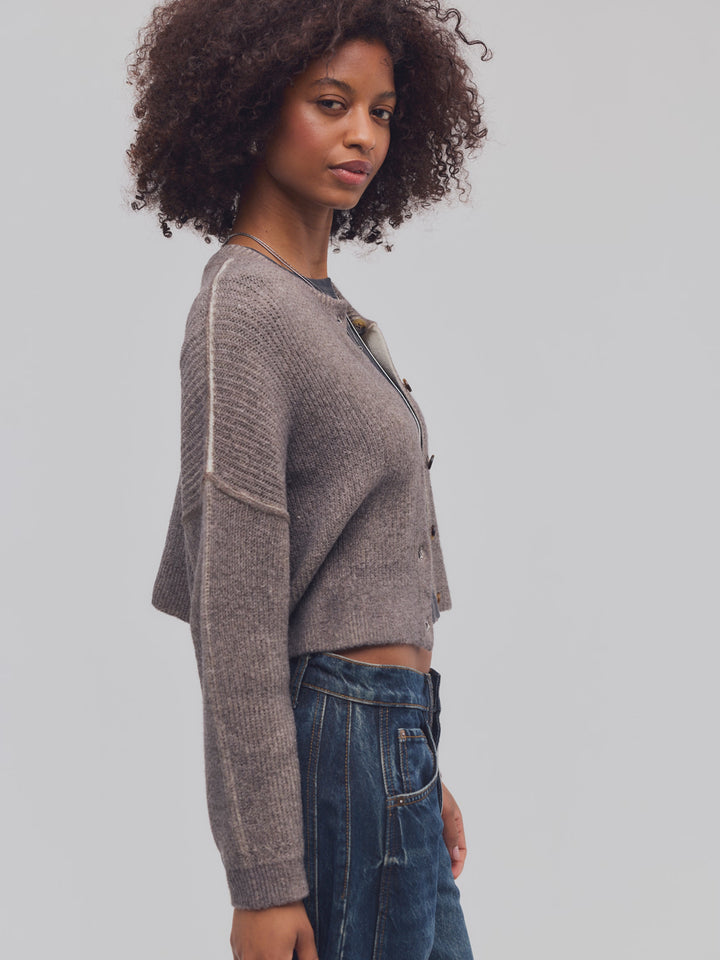 Side view of the Free People Ottilie Cardi in Espresso, featuring a cropped relaxed fit and dropped shoulders | Twentyseven Toronto