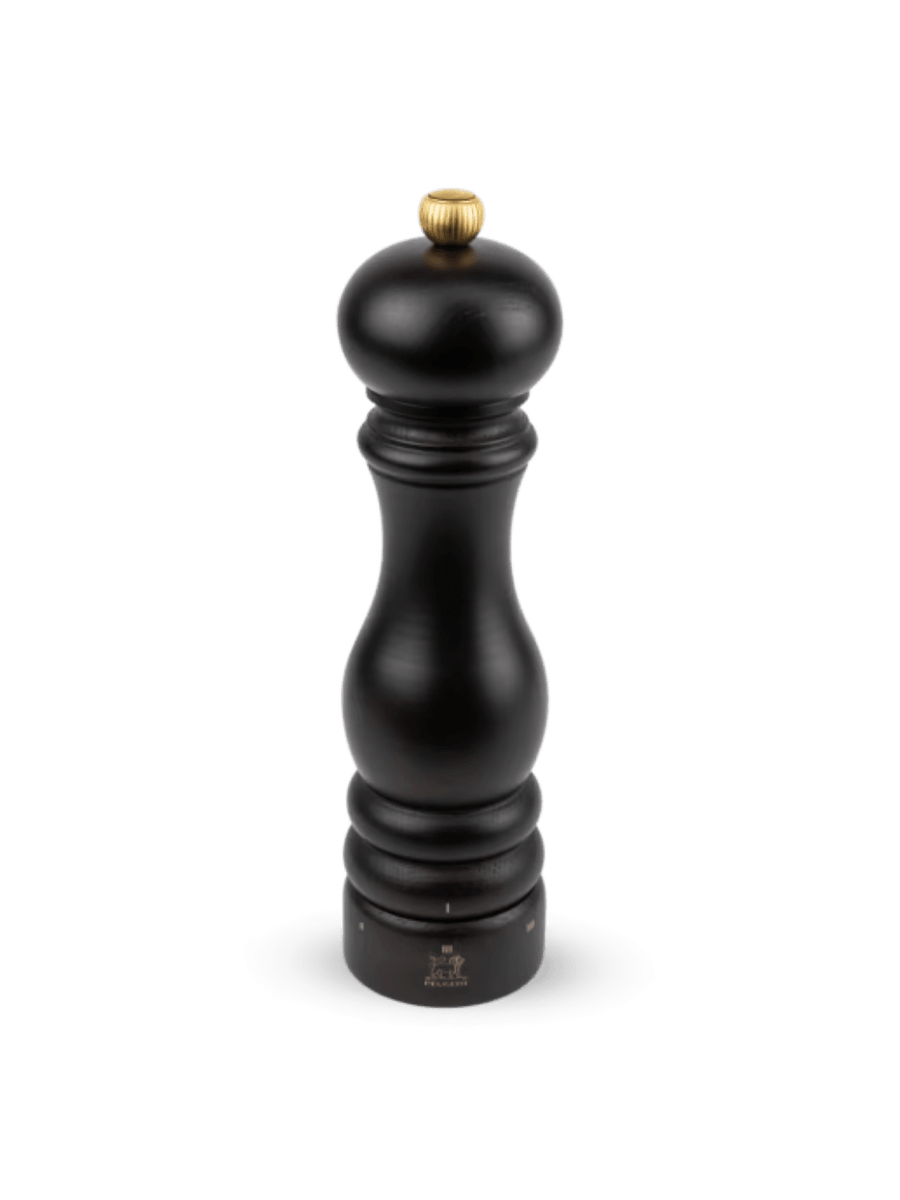 Black 'Paris U'Select' pepper grinder in 'Chocolate Finish' from Peugeot with gold top on a transparent background | Twentyseven Toronto