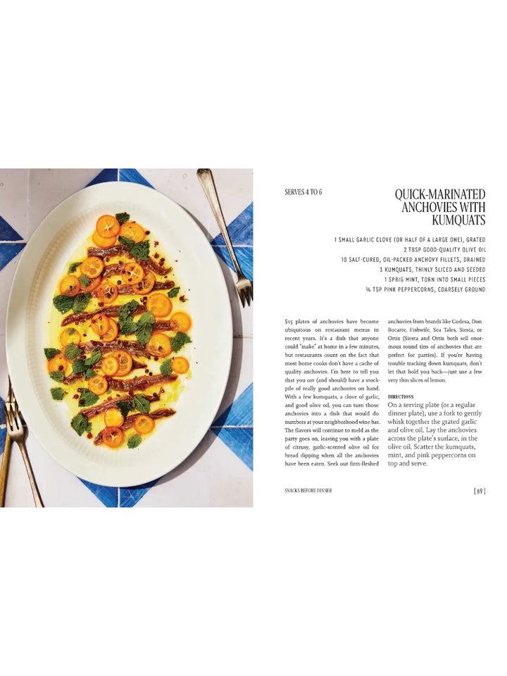 Recipe page for Quick-Marinated Anchovies with Kumquats from Party Tricks: Easy, Elegant Recipes for Snacking and Hosting by Anna Hezel, showcasing an oval platter with neatly arranged anchovy fillets, citrus slices, and fresh mint | Twentyseven Toronto
