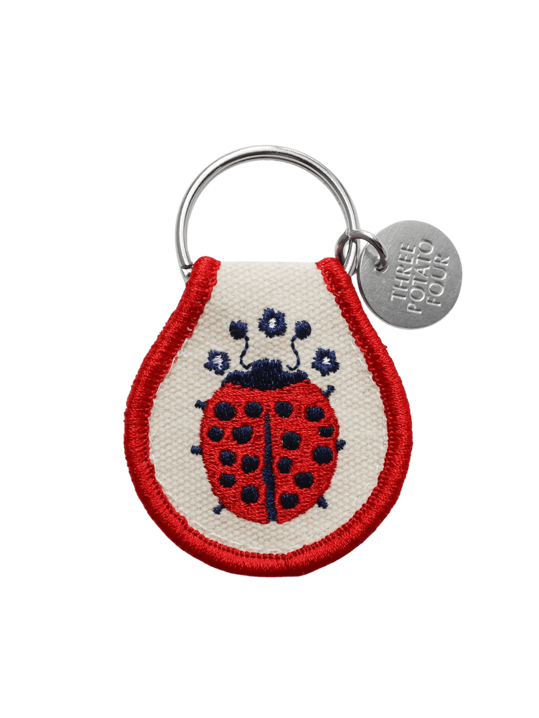 A Three Potato Four Patch Keychain - Ladybug with detailed red and blue embroidery | Twentyseven Toronto