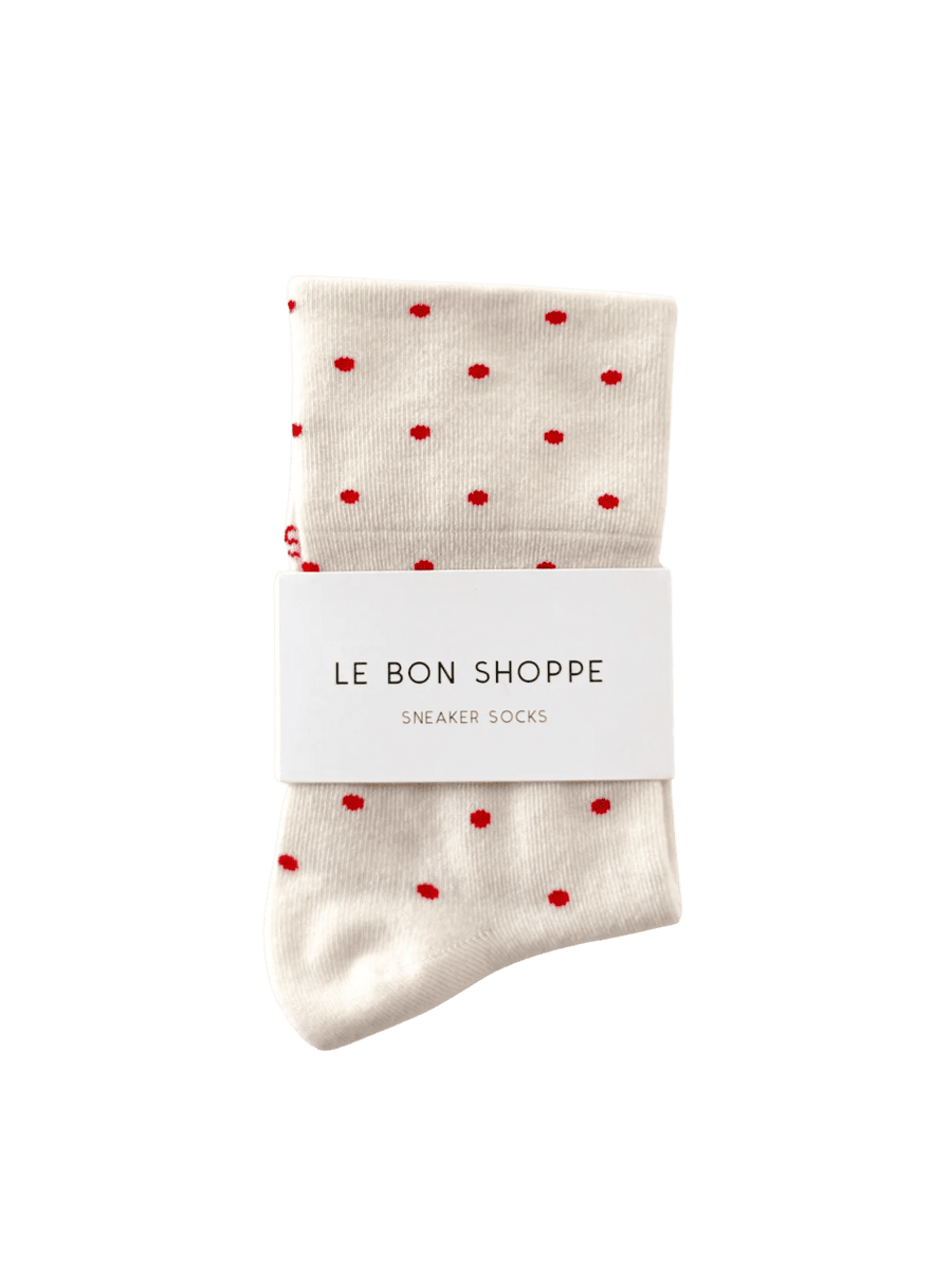 White with red polka dots Sneaker Socks in 'Polka Dot Cream/Red' and white brand labeled 'Le Bon Shoppe' on a transparent background | Twentyseven Toronto