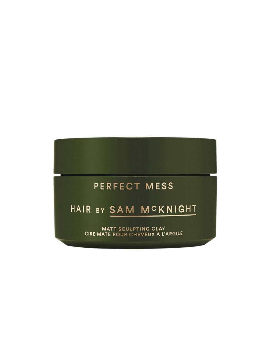 Green jar of 'Perfect Mess' Soft Matt Styling Clay by Sam McKnight on a transparent background, 50ml | Twentyseven Toronto