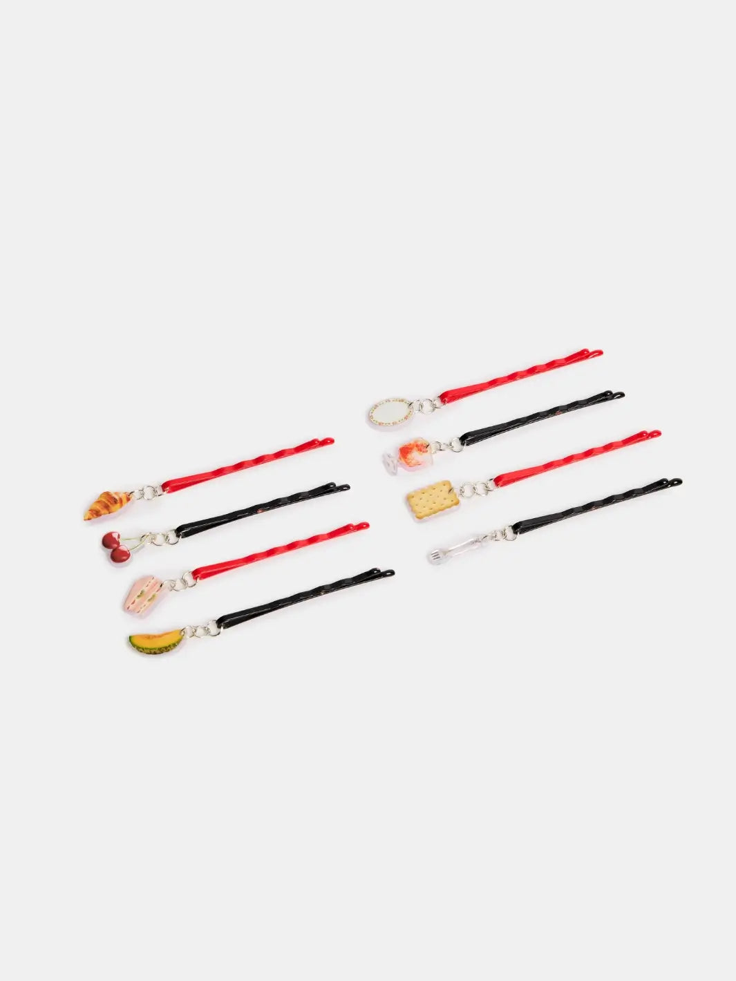 Eight individual red and black enamel-coated Chunks Hairclips Picnic Bobby Pins are arranged in two columns, showing off various picnic-themed acetate charms | Twentyseven Toronto