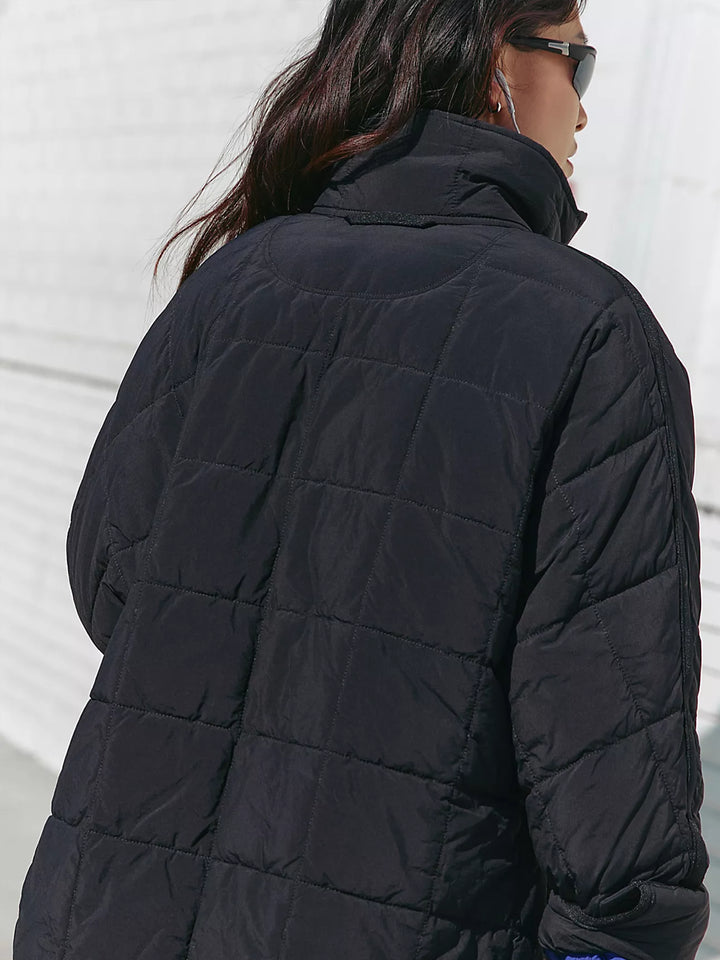Back view of the Pippa Packable Puffer Jacket in Black, showing the oversized quilted silhouette and high collar | Twentyseven Toronto