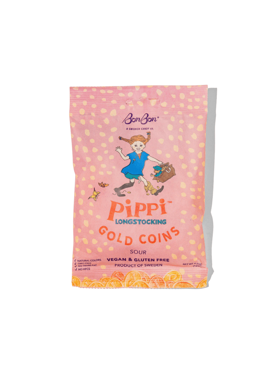A sealed pink pouch with a yellow polka dot pattern prominently showcases Pippi Longstocking Gold Coins Swedish Candy from BonBon NYC against a transparent background | Twentyseven Toronto