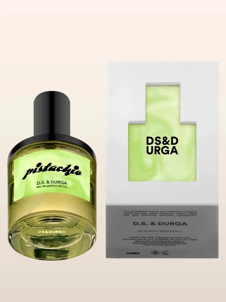 D.S. & Durga 'Pistachio' perfume bottle and packaging on a beige background | Twentyseven Toronto