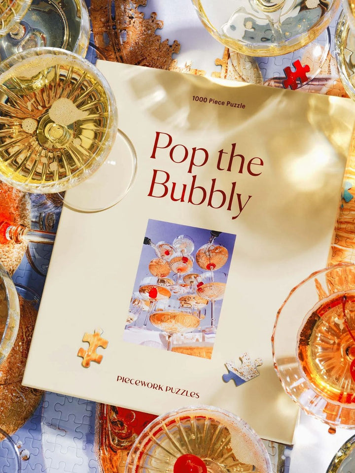 Piecework Puzzles Pop The Bubbly - 1000 Piece Puzzle | Twentyseven Toronto