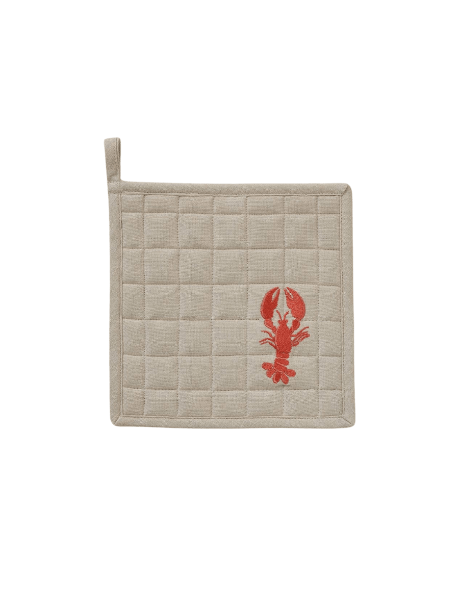 Quilted pot holder with embroidered red lobster design from Sylvie Thiriez on a transparent background | Twentyseven Toronto
