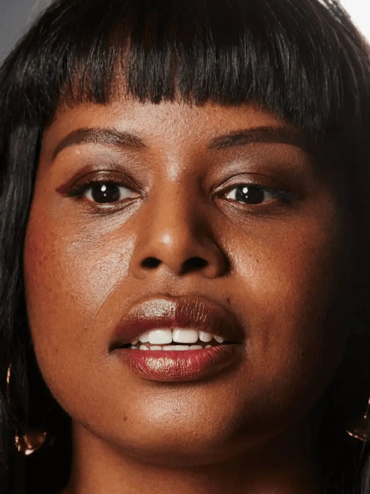 Close-up of woman with dark hair using 19/99 Beauty Precision Colour Pencil in 'Bor' | Twentyseven Toronto