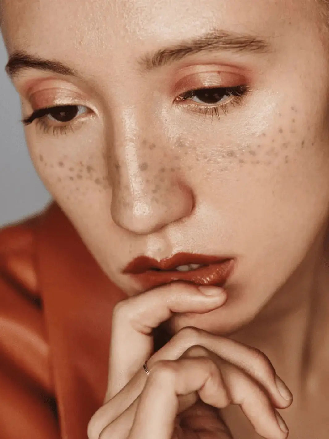 Close-up of a person with freckles using 19/99 Beauty Precision Colour Pencil in 'Neutra' | Twentyseven Toronto