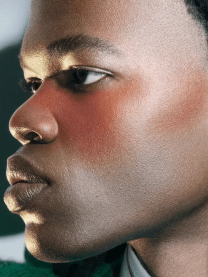 Close-up of a man's face with a neutral expression using 19/99 Beauty Precision Highlight Pencil in 'Oro' | Twentyseven Toronto
