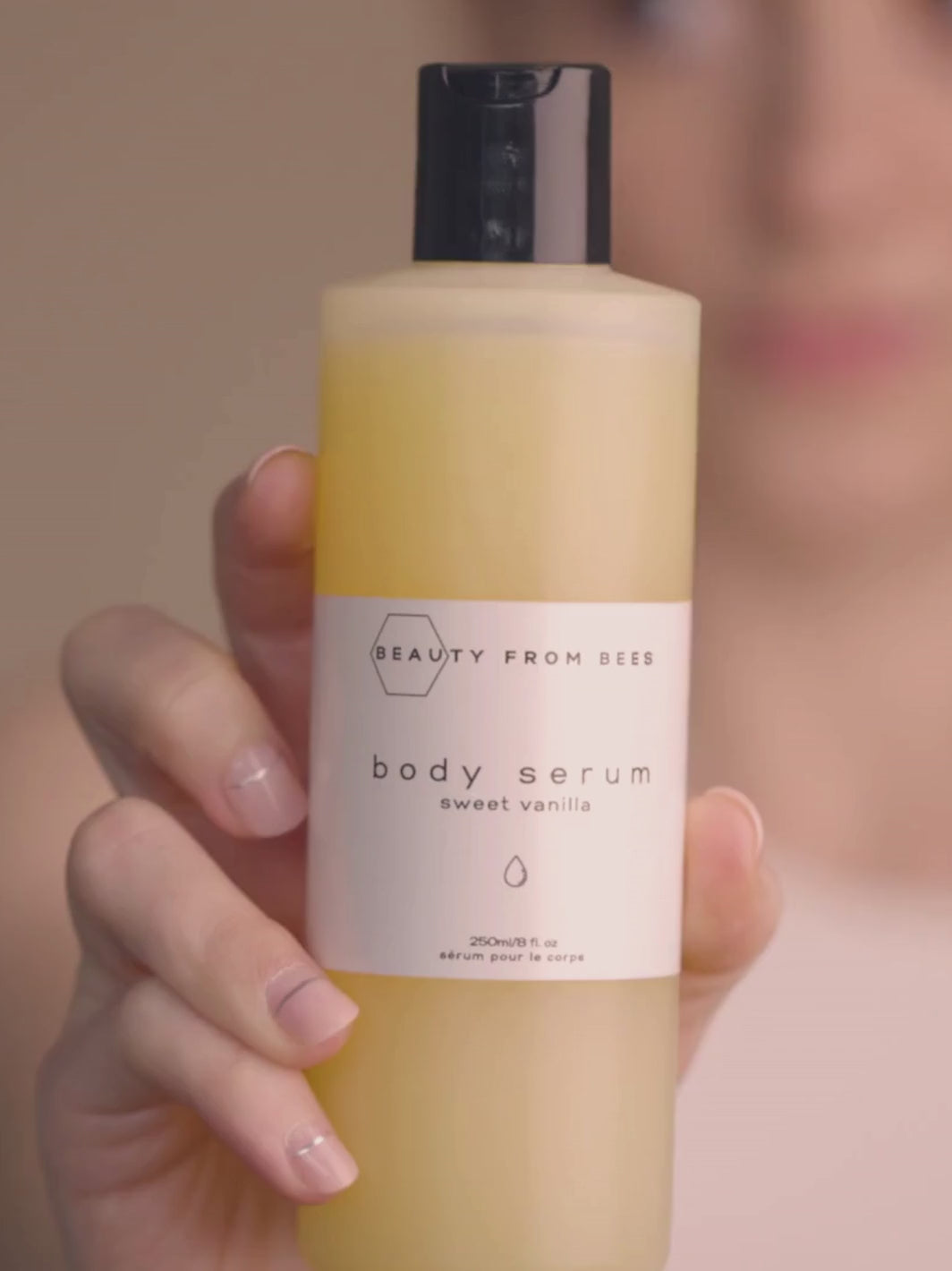 Video of woman showing how to use Beauty from Bees Body Serum in Sweet Vanilla | Twentyseven Toronto