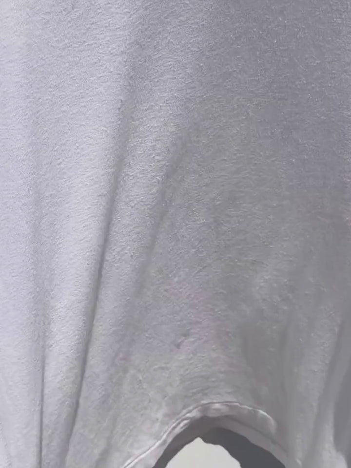 Video closeup showing texture of 'Haze Linen Blend Tee' in 'White' from Le Bon Shoppe | Twentyseven Toronto