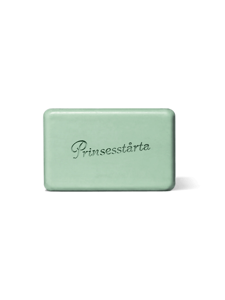 Studio shot of the light green rectangular Flamingo Estate Prinsesstarta Milk Bar soap engraved with script lettering | Twentyseven