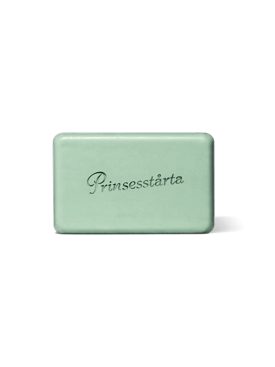 Studio shot of the light green rectangular Flamingo Estate Prinsesstarta Milk Bar soap engraved with script lettering | Twentyseven