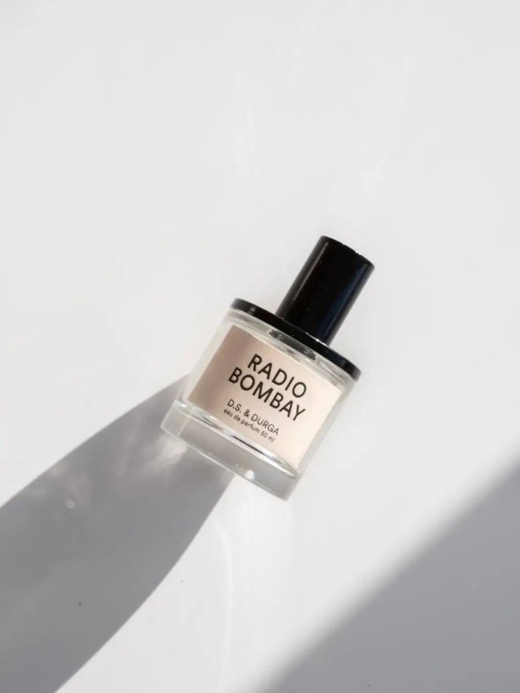 Perfume bottle labeled 'Radio Bombay' from DS & Durga on a light background | Twentyseven Toronto