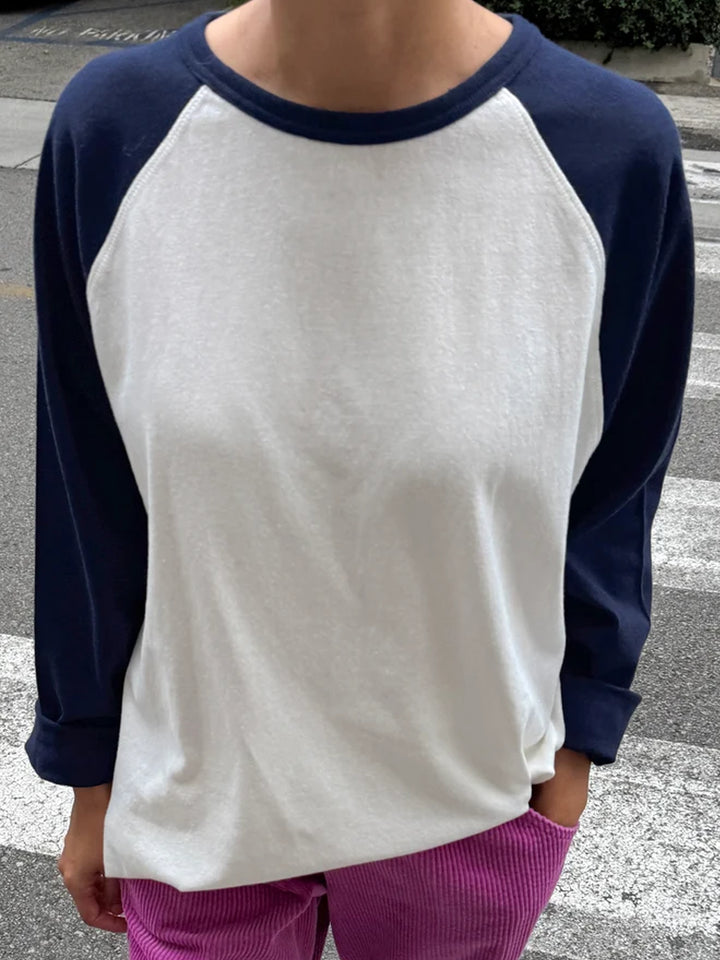 Front view of model wearing the Le Bon Shoppe Raglan Tee in white and midnight navy | Twentyseven Toronto