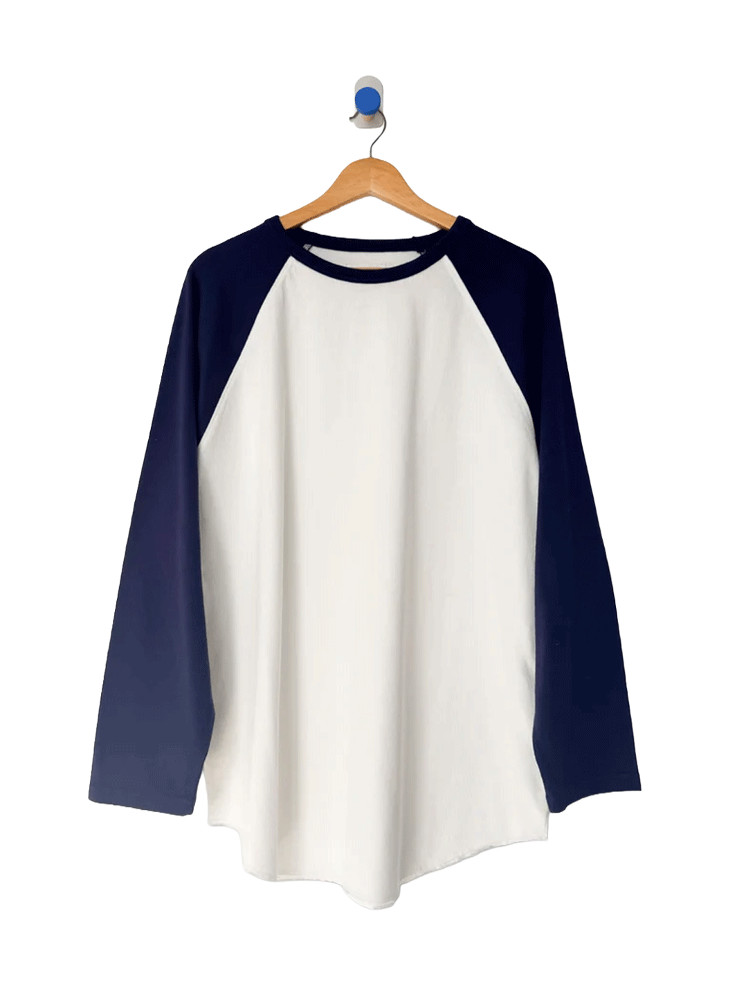 Le Bon Shoppe Raglan Tee in white with midnight navy sleeves on a wooden hanger | Twentyseven Toronto