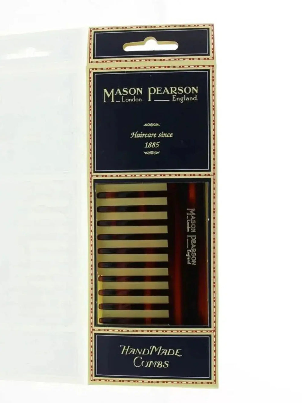 A premium tortoiseshell comb with wide, thick teeth is presented inside its classic navy blue and cream retail cardboard packaging to showcase the design of the Mason Pearson Rake Comb C7 | Twentyseven Toronto
