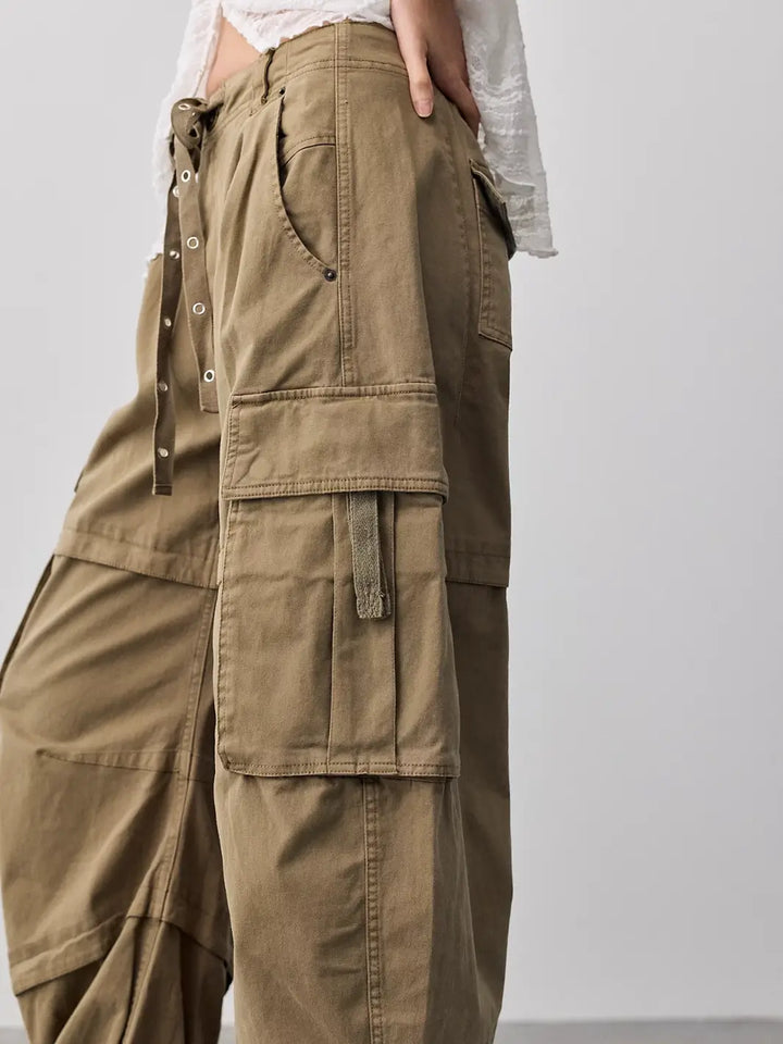 Close-up side view of the spacious side cargo pocket on the Free People We the Free Reef Curved Twill Cargo Pants in Aloe | Twentyseven