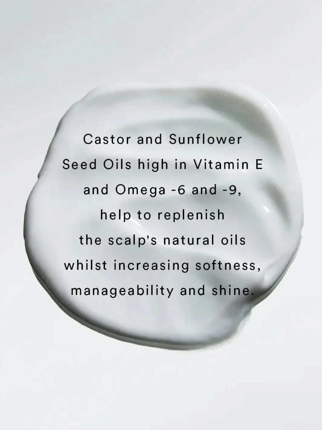 A smooth smear of white cream serves as the background for text highlighting the hair-softening oil ingredients in Hair by Sam McKnight Rich Nourishing Conditioner | Twentyseven Toronto