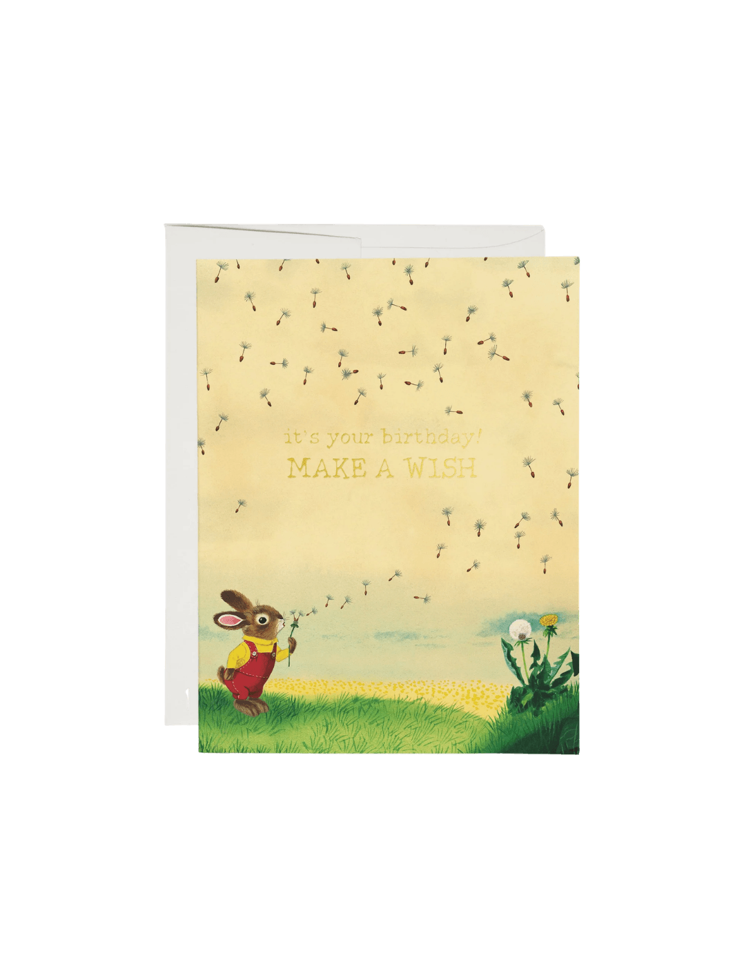 A Red Cap Cards Bunny and Dandelion Greeting Card by Richard Scarry features an illustrated little rabbit in overalls blowing dandelion seeds into the air next to a white envelope | Twentyseven Toronto