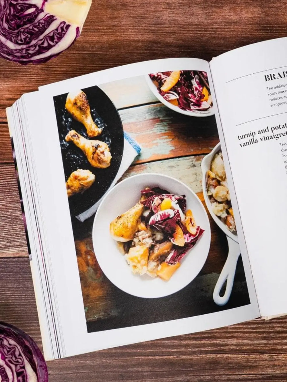 Photograph inside the cookbook Ruffage: A Practical Guide to Vegetables by Abra Berens showing a plated meal of roasted chicken drumsticks served with a colourful salad of radicchio and citrus | Twentyseven Toronto