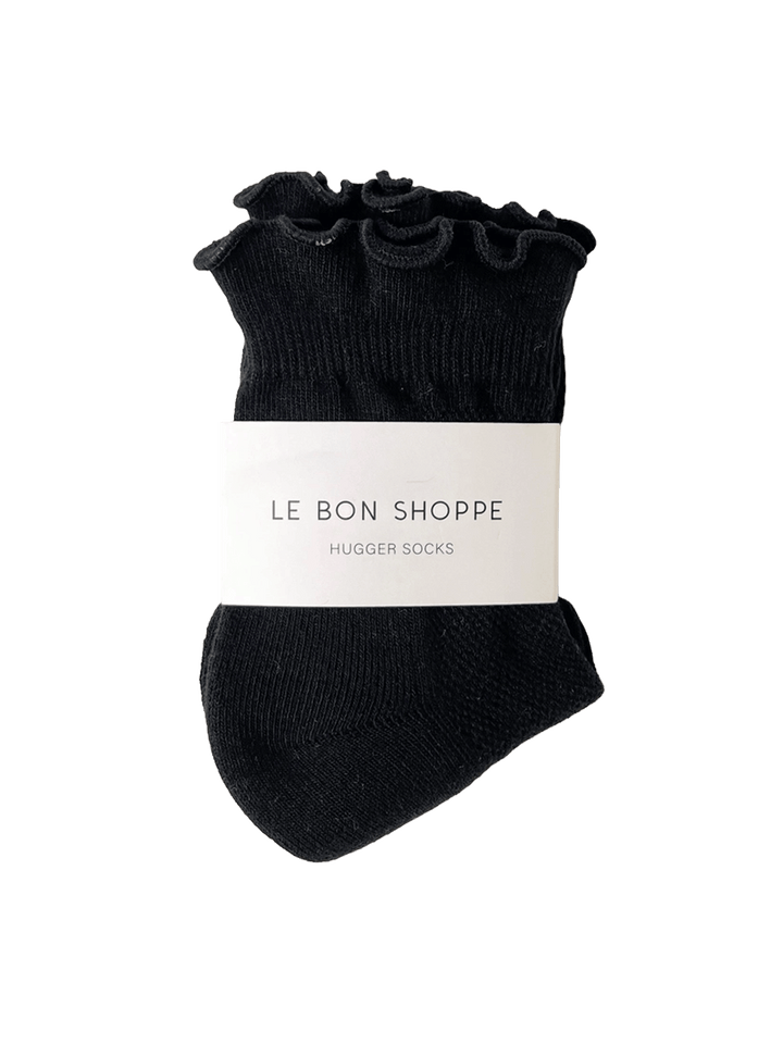 Le Bon Shoppe Ruffler Hugger Crew Socks in Black/Black with ruffled cuffs and branded packaging  Twentyseven Toronto