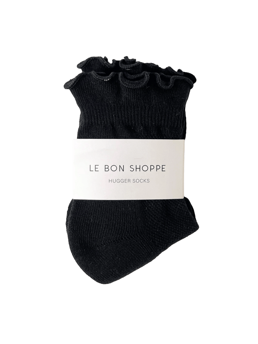 Le Bon Shoppe Ruffler Hugger Crew Socks in Black/Black with ruffled cuffs and branded packaging  Twentyseven Toronto