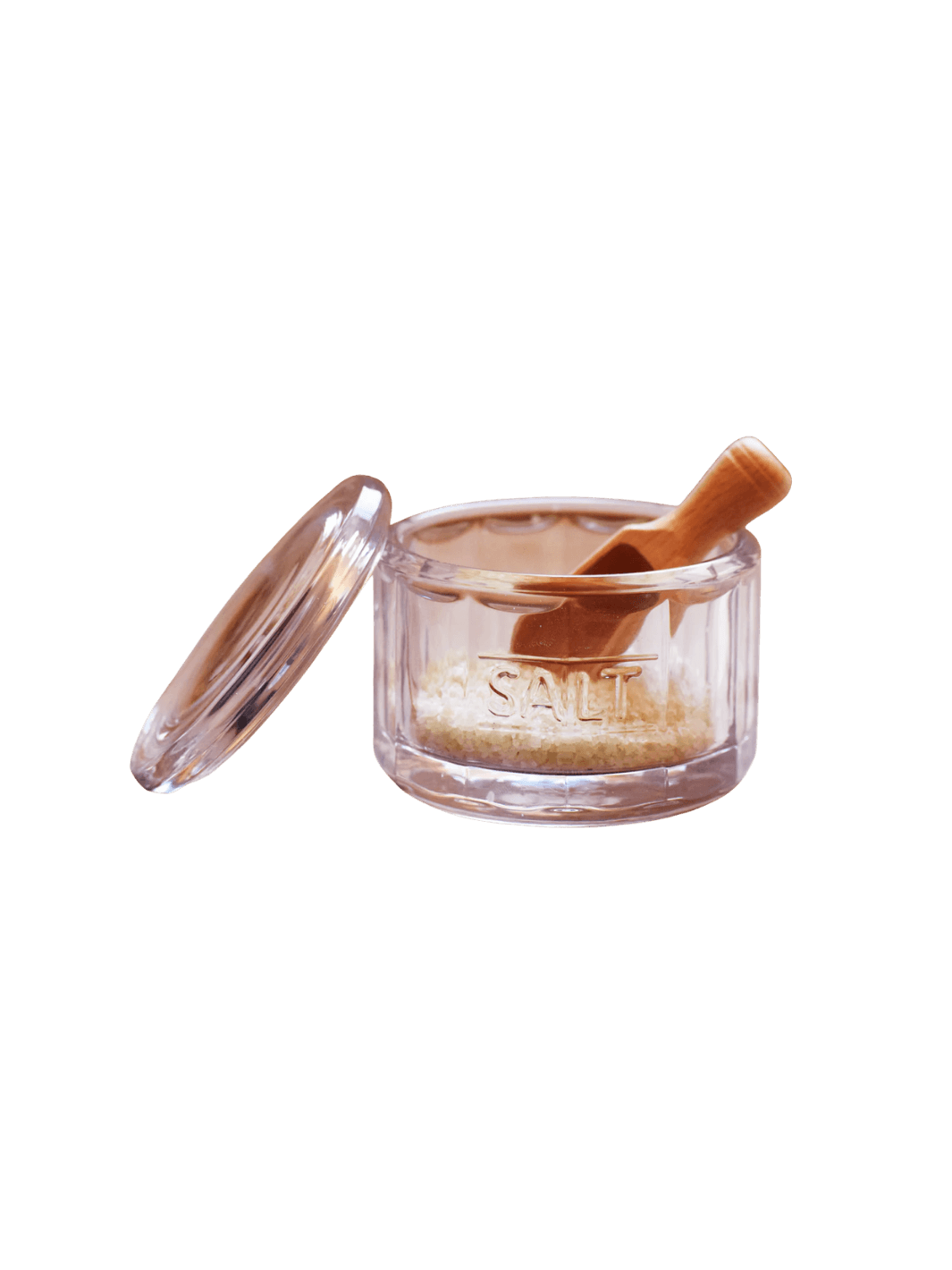 A ribbed glass Salt Pot w/ Scoop from Earth and Nest with the word "SALT" embossed on the front, complete with an open glass lid and an included wooden scoop | Twentyseven Toronto
