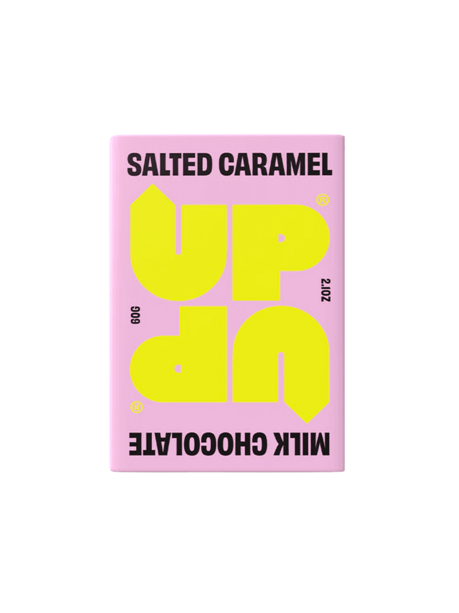 UP UP Chocolate Salted Caramel Milk Chocolate in pink and yellow packaging | Twentyseven Toronto